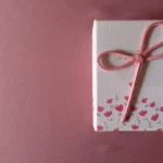 white and red heart print gift box