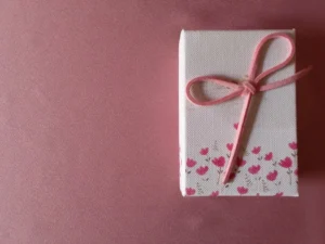 white and red heart print gift box