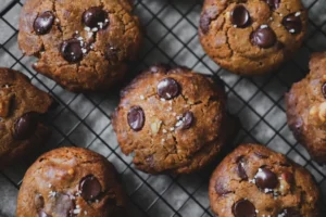 Chocolate chip cookies with sea salt on cooling rack