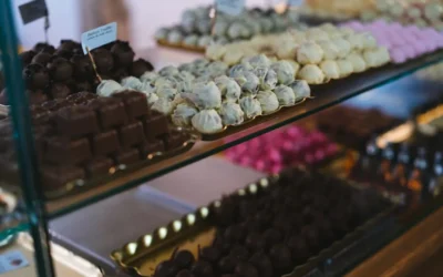 a display case filled with lots of different types of chocolates